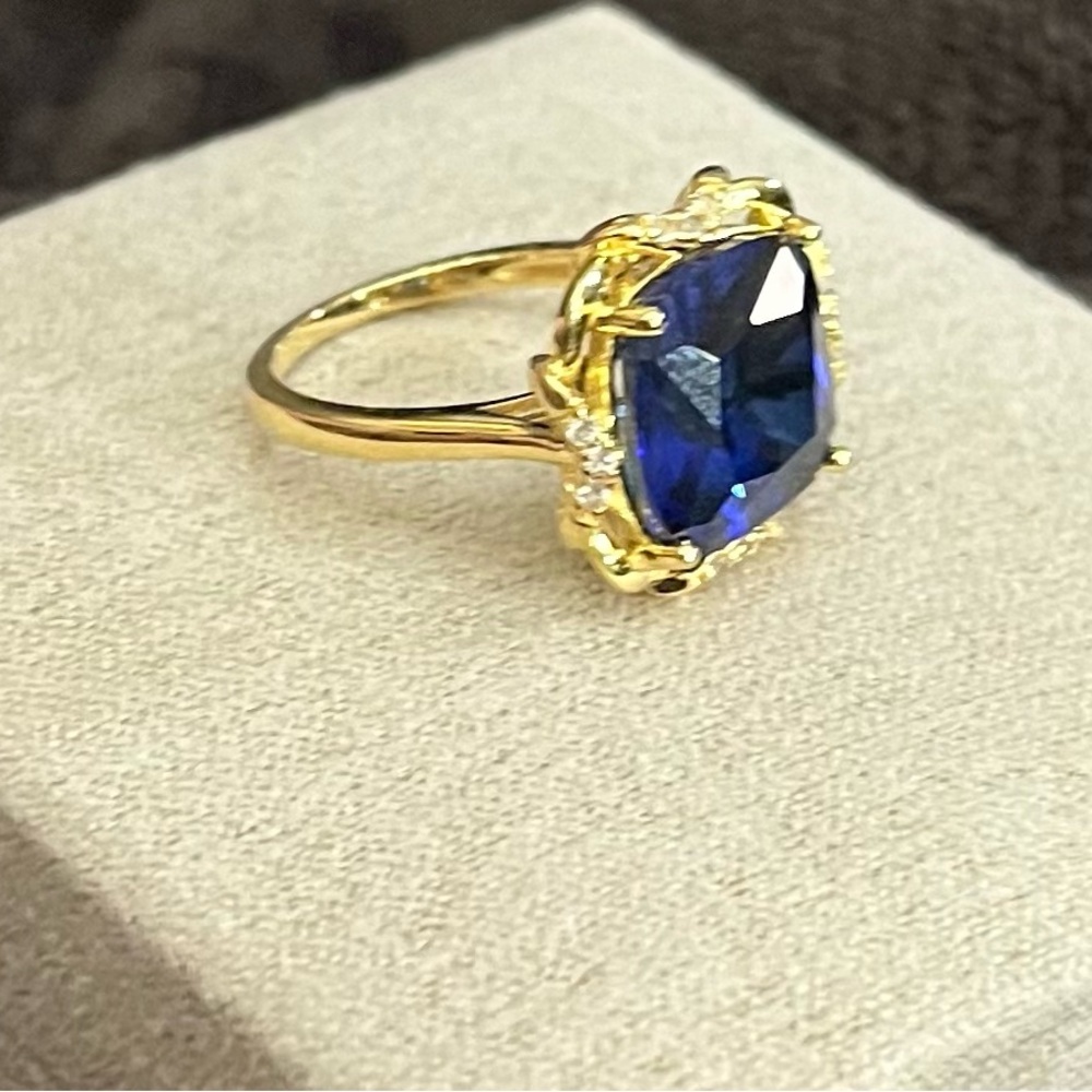 JTV Gold Ring with Deep Blue Gemstone